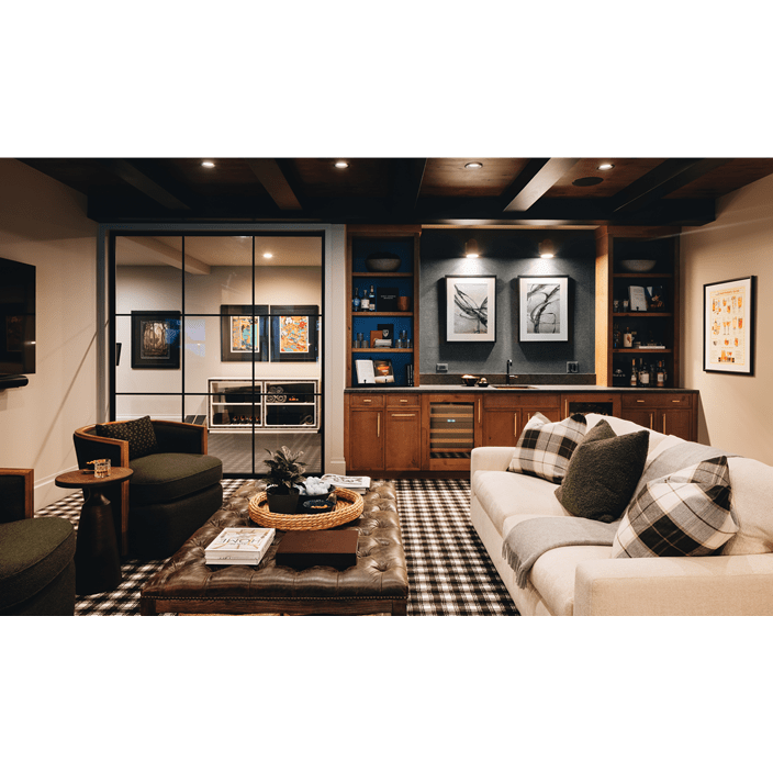 Inspired by a Scottish pub, the basement features a Sub-Zero Undercounter Refrigerator and Wine Storage unit.