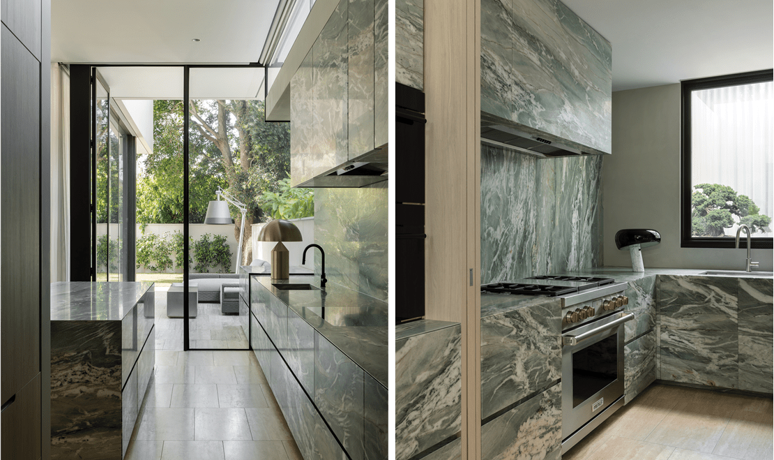 Additional views of Raffoul's kitchen features gorgeous marble green paneling that litters the entirety of the kitchens.