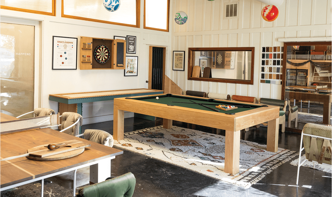 Woosley opened his woodworking studio in 2010. His studio focuses on handcrafted furniture and gaming boards.