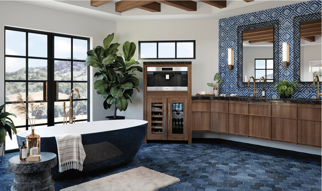 Receive hot and cold drinks in a resort-like bathroom featuring a Designer Wine and Beverage Center and Wolf Coffee Maker.