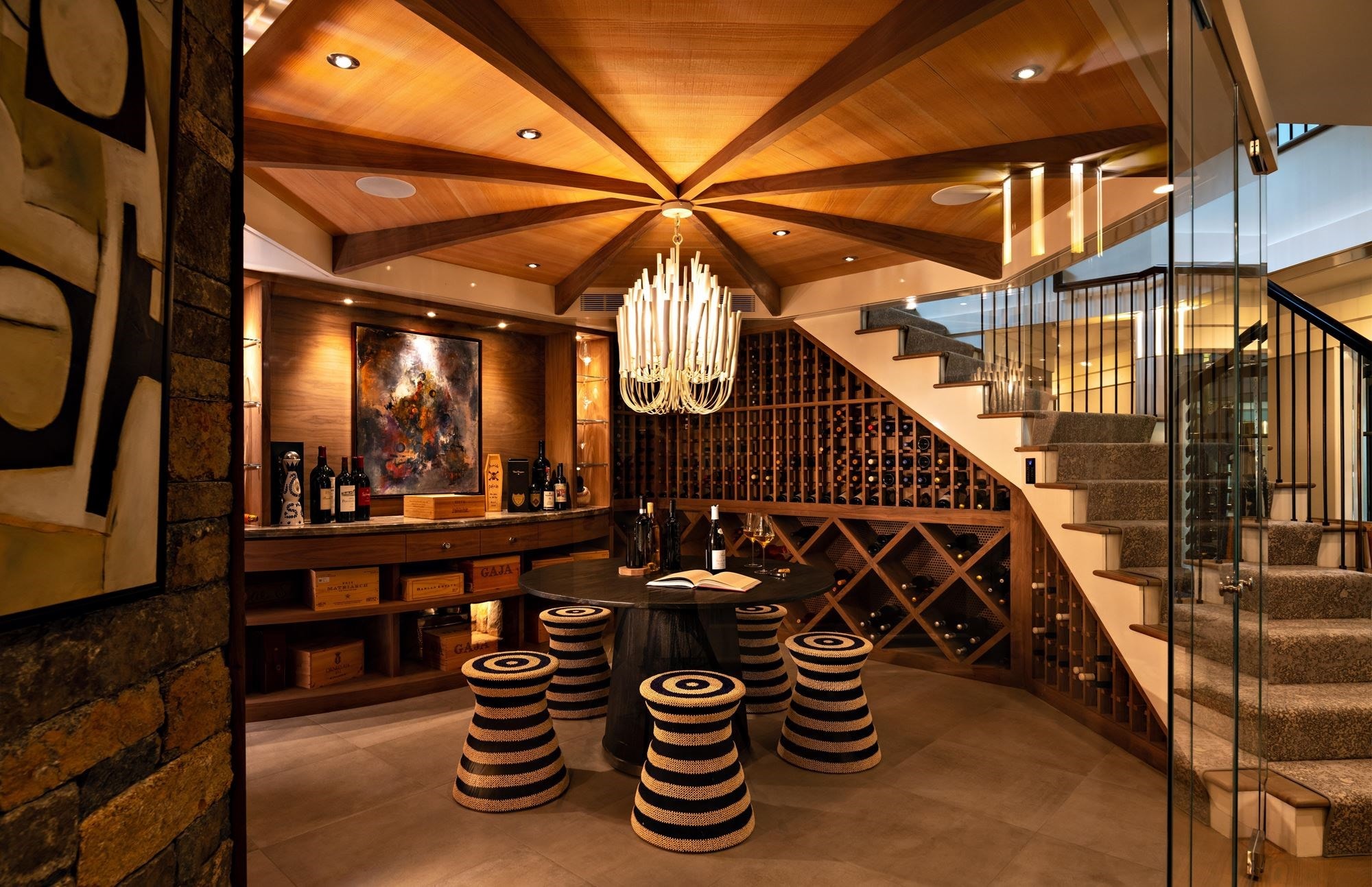 A cavern-like wine cellar for storage and celebration is the centerpiece of a New England home.