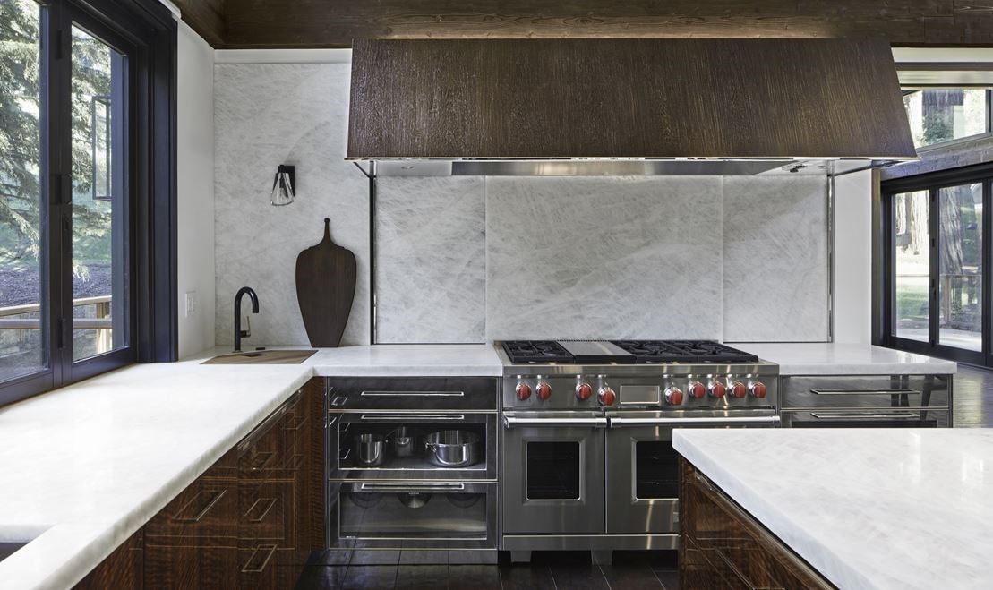 Wolf 6 Burner Gas Range with Griddle featured in a custom kitchen designed by Mick De Giulio in California.