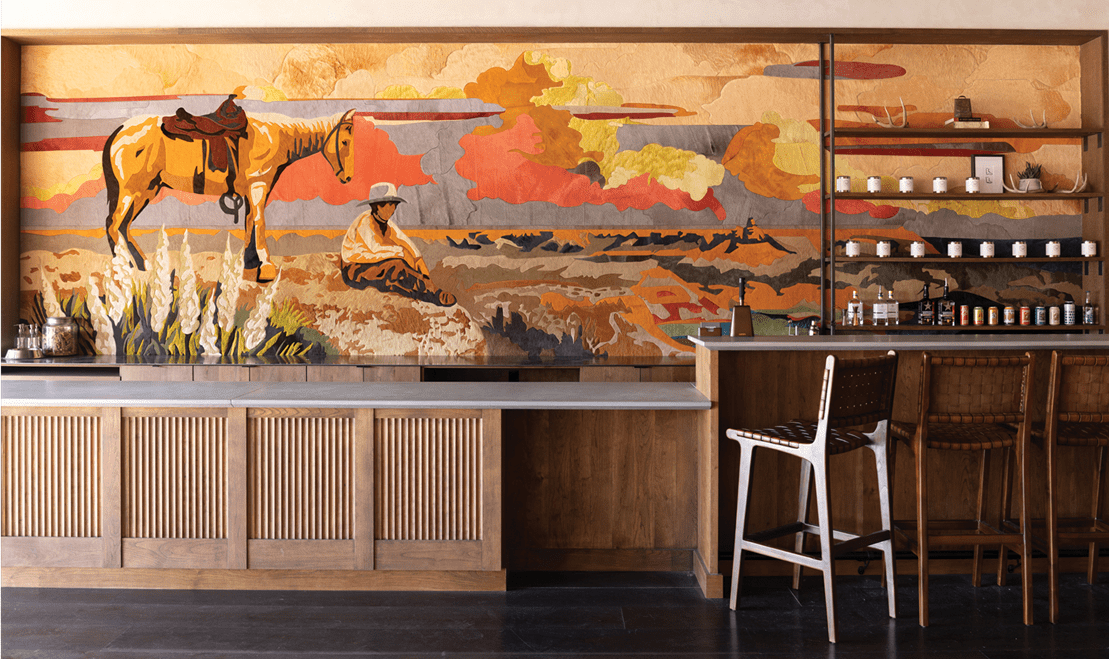 Landry McMeans' distinctive design shines in this cowboy-themed mural at the Tecovas flagship store in Austin, Texas.