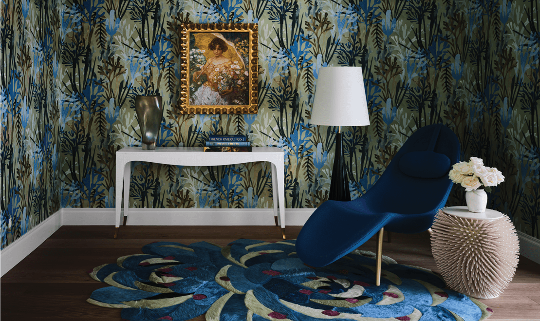 A unique blue-and-green space featuring a custom floral rug created by Kyle Bunting for Salicito Design Group.