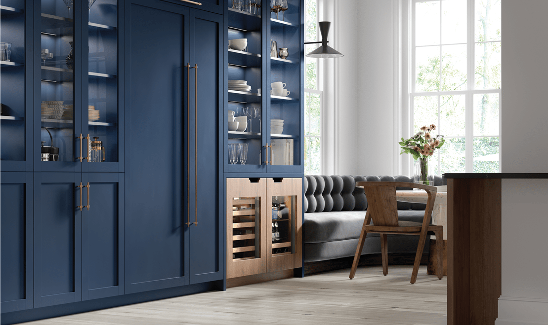 An image of the Breakfast Club room near the kitchen features an ADA-height Sub-Zero Beverage Center and Wine Storage Unit.