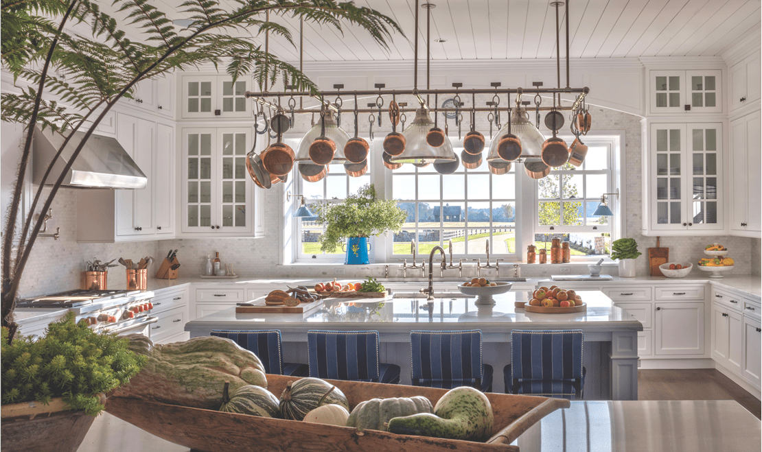 The kitchen showcases a Wolf 48-inch Dual Fuel Range, a 24-inch Microwave Drawer, and a Sub-Zero 48-inch Refrigerator.