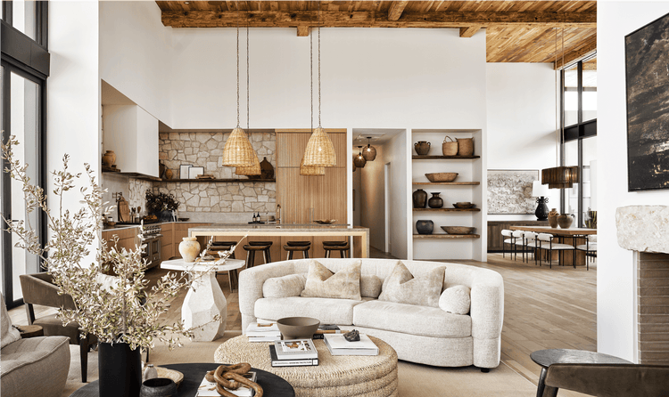 The living room features a Marta sofa, a Pascal coffee table crafted in Indonesia from pandan leaves, and a Maricopa table in reclaimed wood.