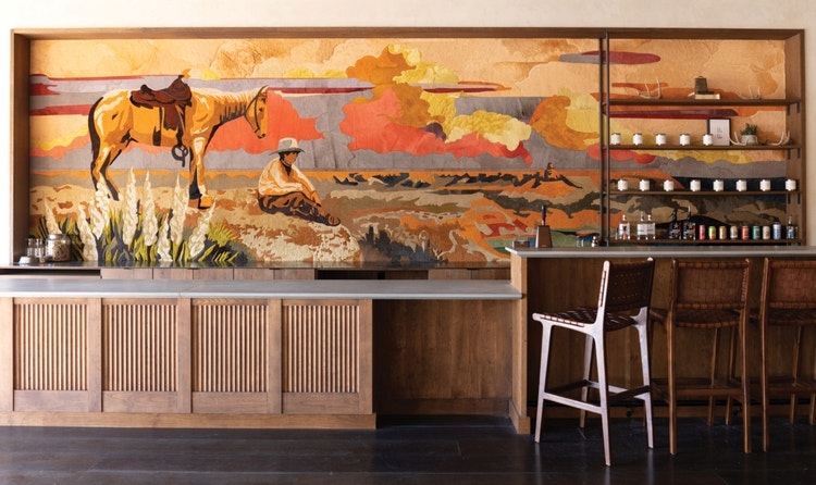 Landry McMeans' distinctive design shines in this cowboy-themed mural at the Tecovas flagship store in Austin, Texas.