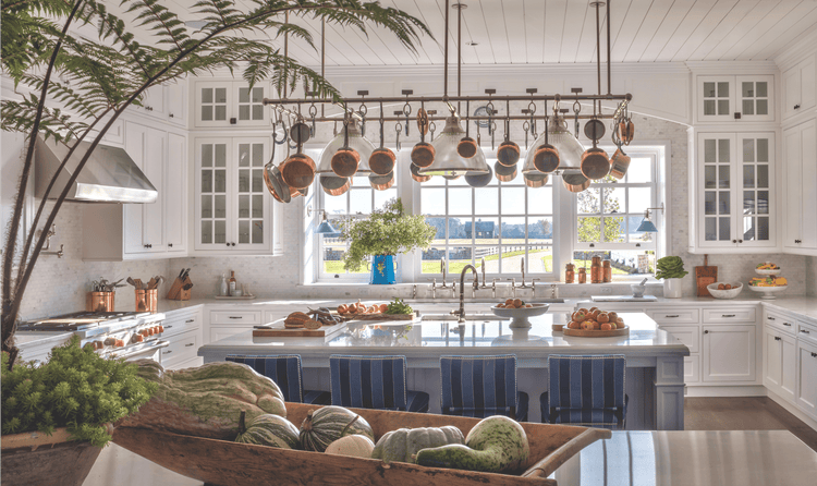 The kitchen showcases a Wolf 48-inch Dual Fuel Range, a 24-inch Microwave Drawer, and a Sub-Zero 48-inch Refrigerator.