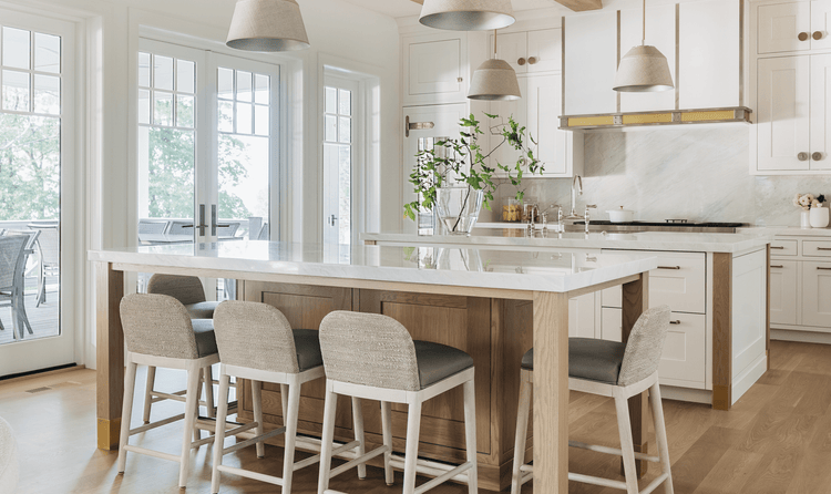 The kitchen features a wonderful outside view directly from the dining table.