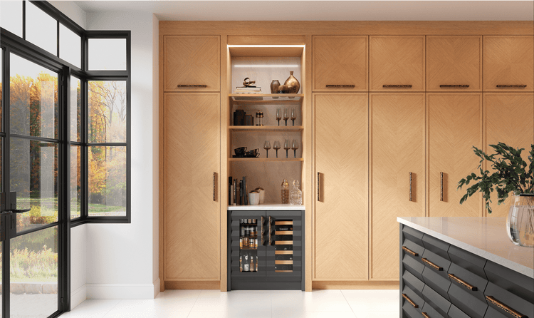 A dazzling and sleek kitchen annex holds dual Sub-Zero Undercounter Beverage Center and Wine Units in the beverage area.