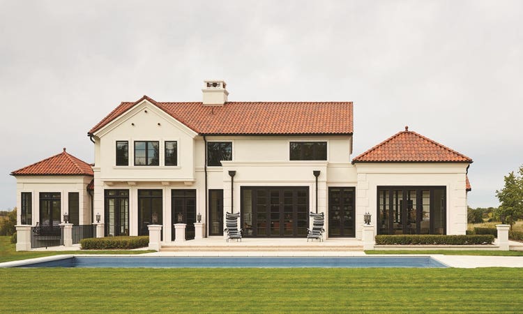 For this elegant and expansive suburban home, designed by James McNeal Architects and Designers, Voss created a sophisticated interior, well suited to the lives of a multi-generational family.