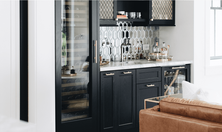 The bar and lounge area, or the &quot;hearth room&quot;, features a Sub-Zero Beverage Refrigerator and a Sub-Zero Wine Storage unit.