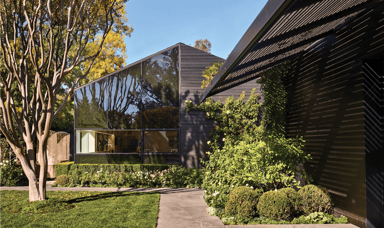 The French Laundry's buildings have shared modern and classic aesthetics, like this half-glass, half-barnlike building.