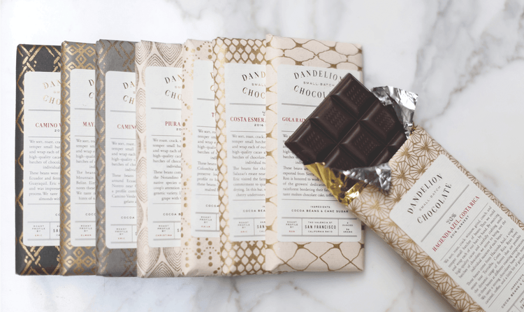 Dandelion Chocolate's packaging is individually hand-wrapped and displays the origin, harvest year, and tasting notes.