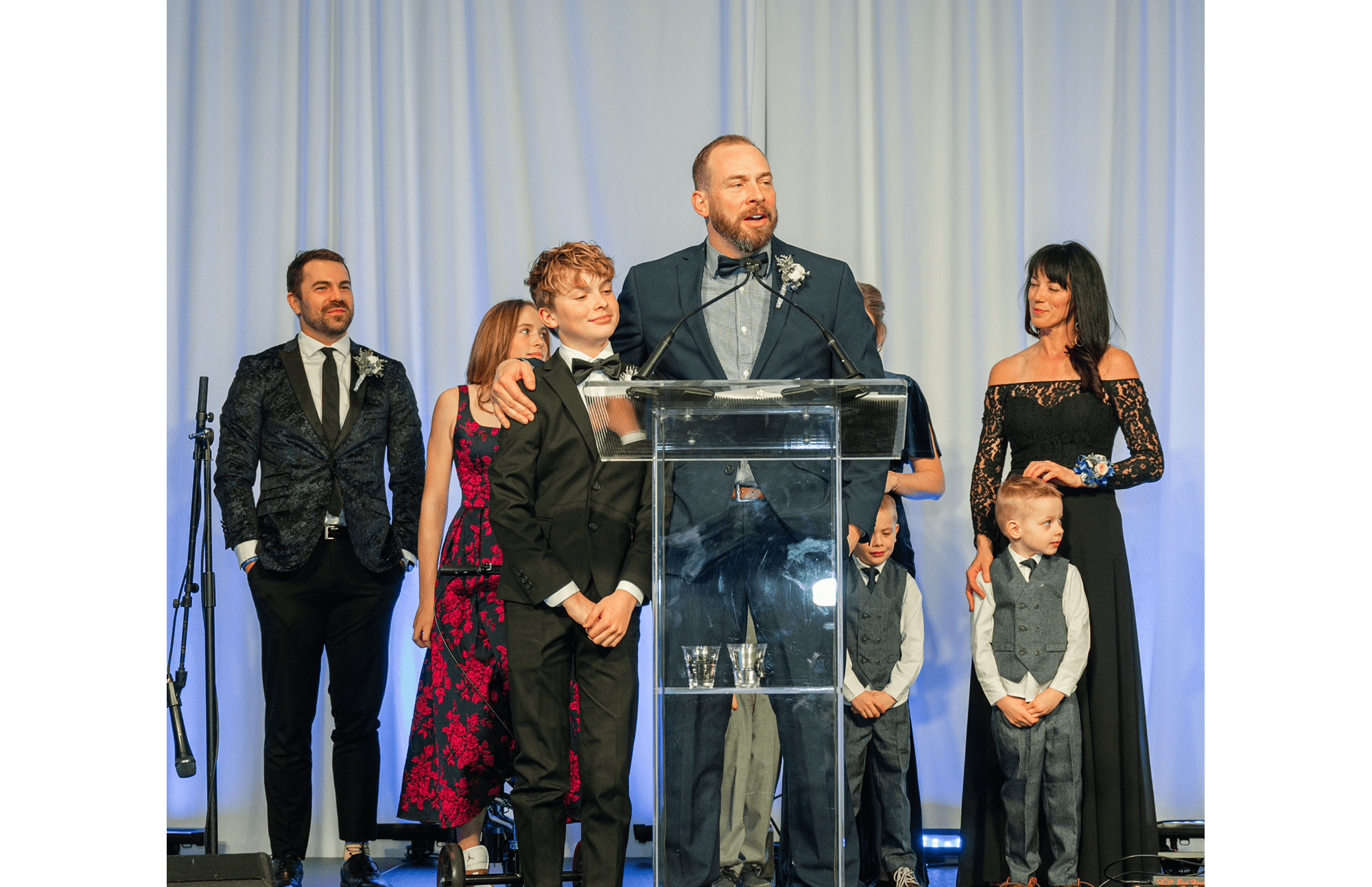 Levi Adams standing next to his father as they speak about Levi's journey with Type 1 diabetes.