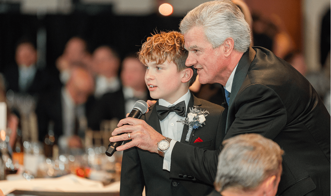 12-year-old Levi Adams helping the Breakthrough T1D's auctioneer during the Wisconsin Gala last march.