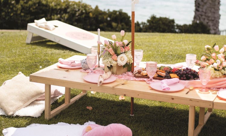 Scenic boho-beach aesthetic by Pop-Up Parties using vintage linens and glassware