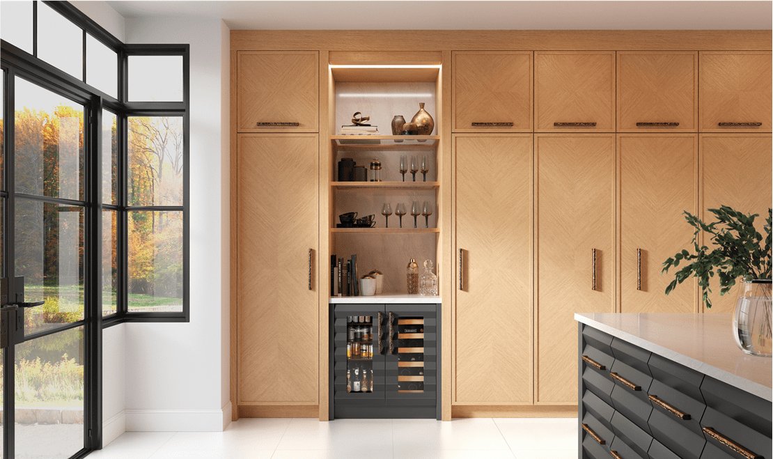 A dazzling and sleek kitchen annex holds dual Sub-Zero Undercounter Beverage Center and Wine Units in the beverage area.