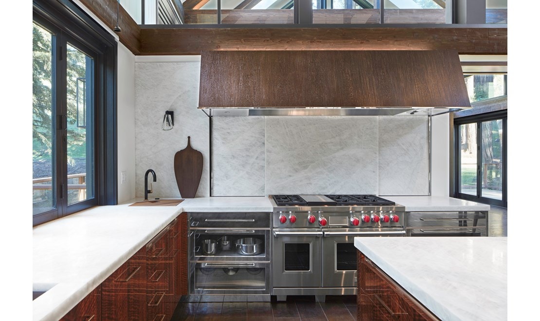 Wolf 6 Burner Gas Range with Griddle featured in a custom kitchen designed by Mick De Giulio in California.