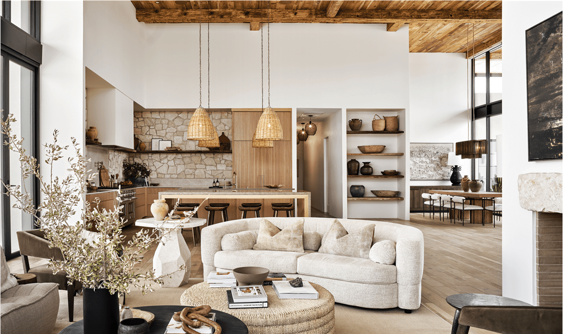 The living room features a Marta sofa, a Pascal coffee table crafted in Indonesia from pandan leaves, and a Maricopa table in reclaimed wood.