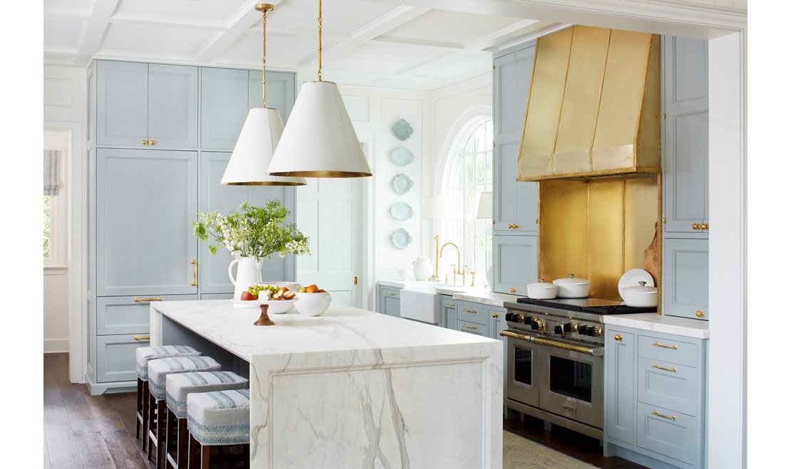 Brass and gold tones are incorporated throughout this Matthew-Quinn designed kitchen in the Buckhead neighborhood of Atlanta.