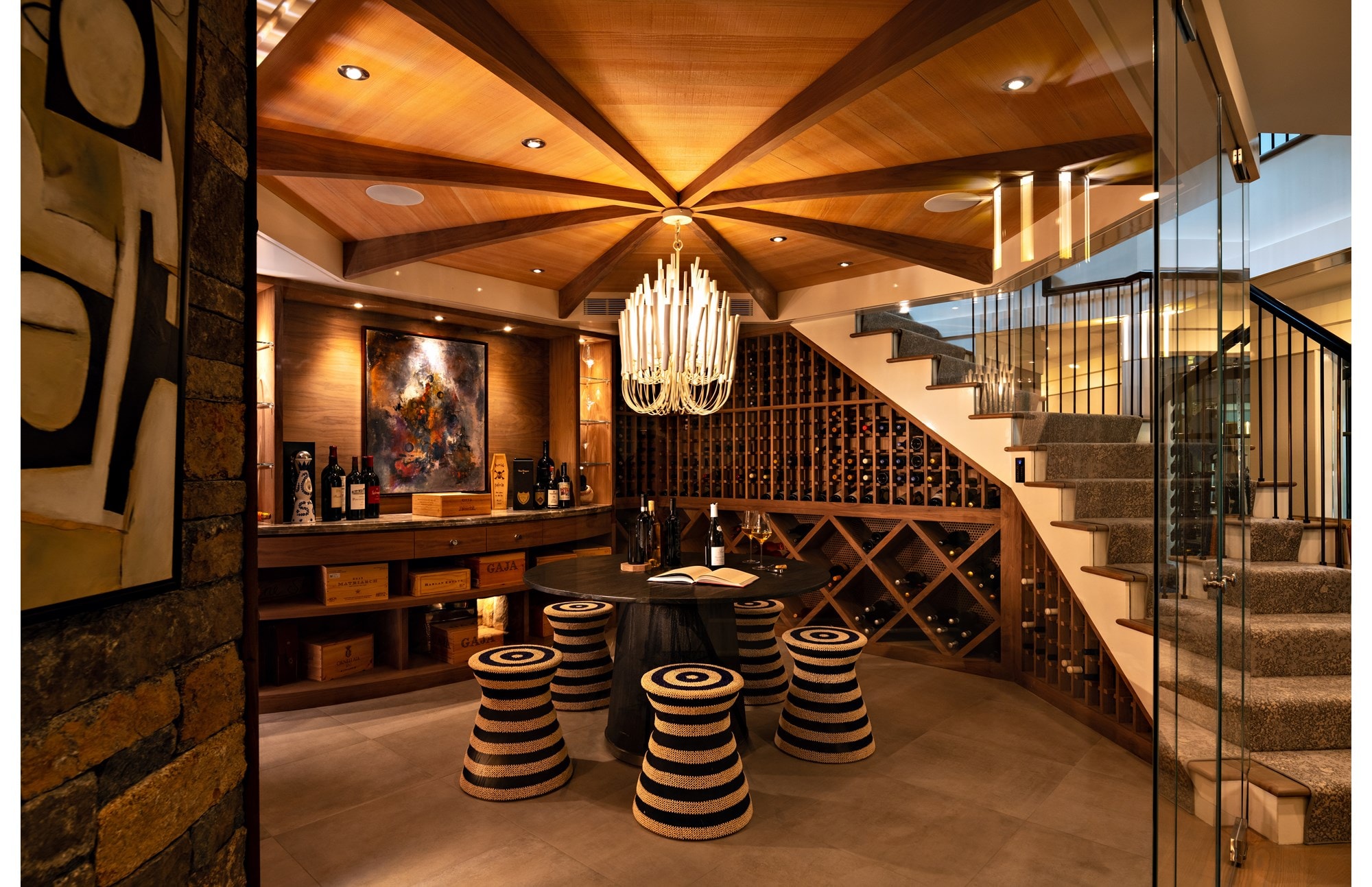 A cavern-like wine cellar for storage and celebration is the centerpiece of a New England home.