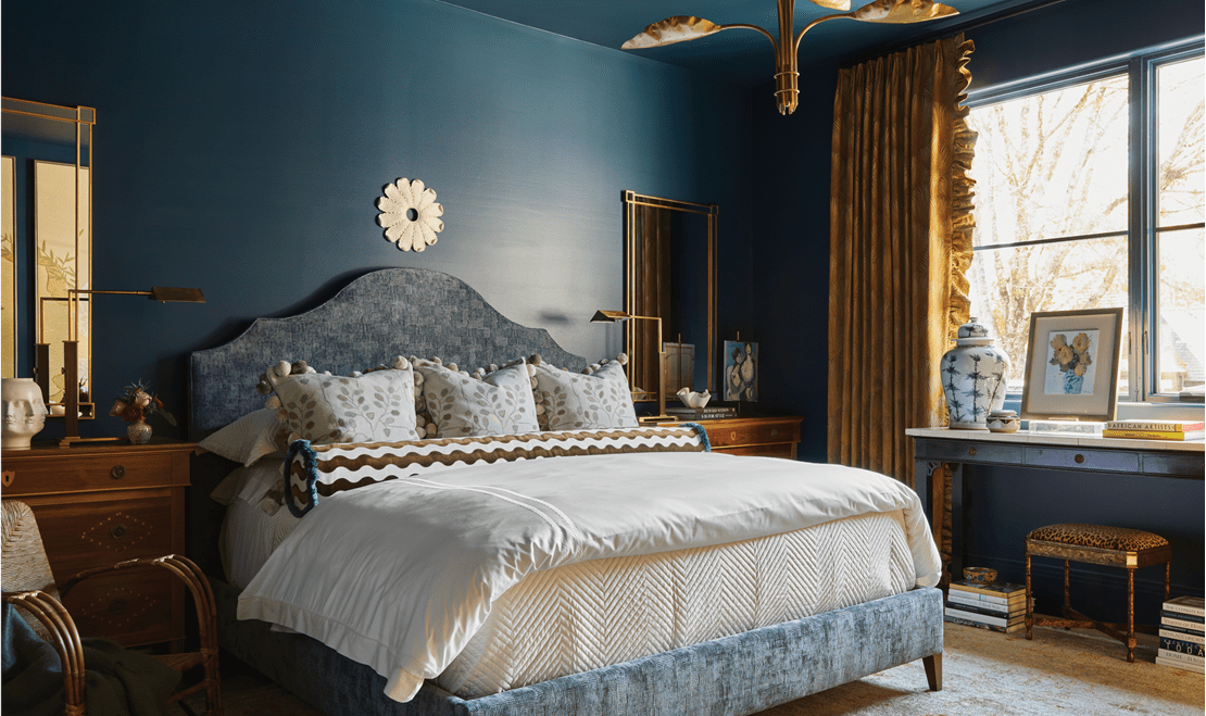 The primary bedroom design by Chris Holt of Holt Interiors complemented Barbara Westbrook's expansive family room.