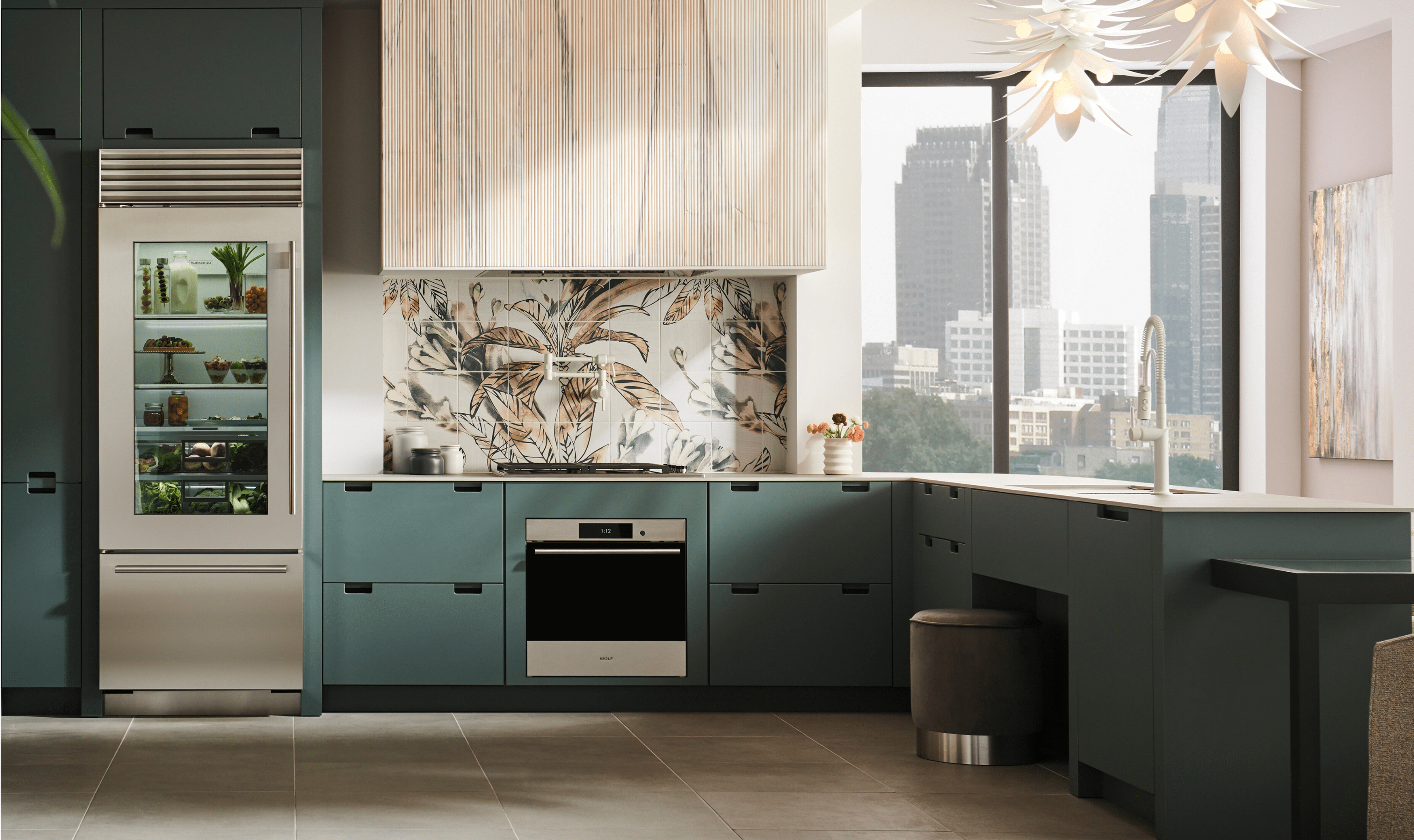 An exterior shot of a kitchen with Sub-Zero, Wolf, and Cove appliances highlighting a paneled Cove Diswasher.