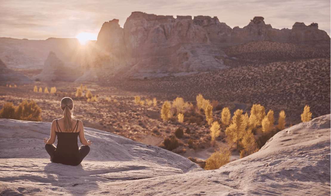 Yoga on the Rocks allows you to view the Colorado Plateau as an Amangiri fitness specialist leads a workout session.