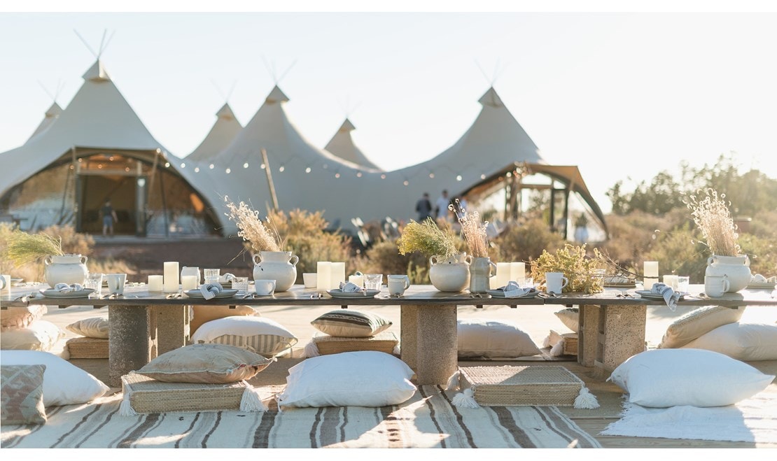 Under Canvas Grand Canyon is set upon 160-acres of woodland. The living area and king guest tent in Moab.