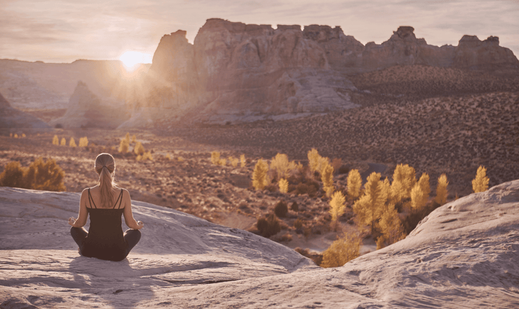 Yoga on the Rocks allows you to view the Colorado Plateau as an Amangiri fitness specialist leads a workout session.